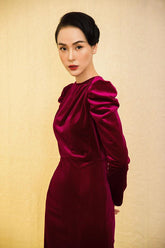 Velvet midi dress with ruched puff sleeves and elegant tailored fit for evening wear